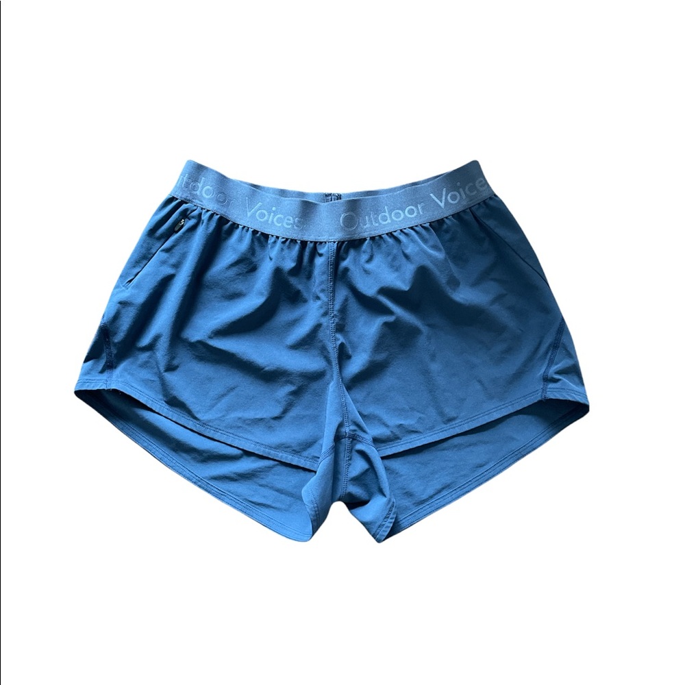 Outdoor Voices running shorts has a pocket with zipped 
Unlined